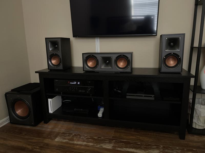 Klipsch R-41M Bookshelf Speakers set up in a  room