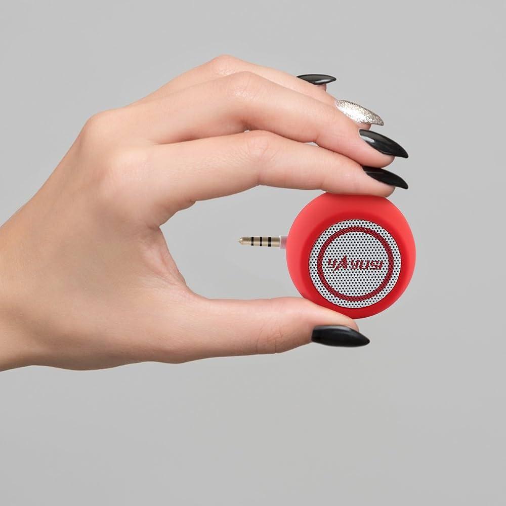 A female hand holding a K-Tech B5 Mini Portable Speaker